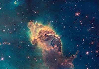 Jet in Carina Nebula. Composed of gas and dust. Scorching radiation and winds from nearby stars are sculpting the pillar and causing new stars. Elements of this image furnished by NASA.