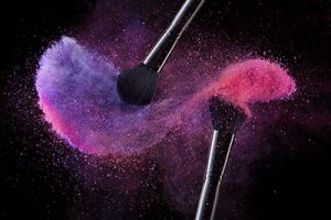 Cosmetic Brushes And Explosion Colorful Powders. Close Up Of Makeup Soft Blush Brushes Releasing Cloud Of Violet And Pink Powder Splash On Black Background. Makeup Tools. High Quality Image.