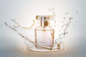 Bottle of perfume with splash on light background